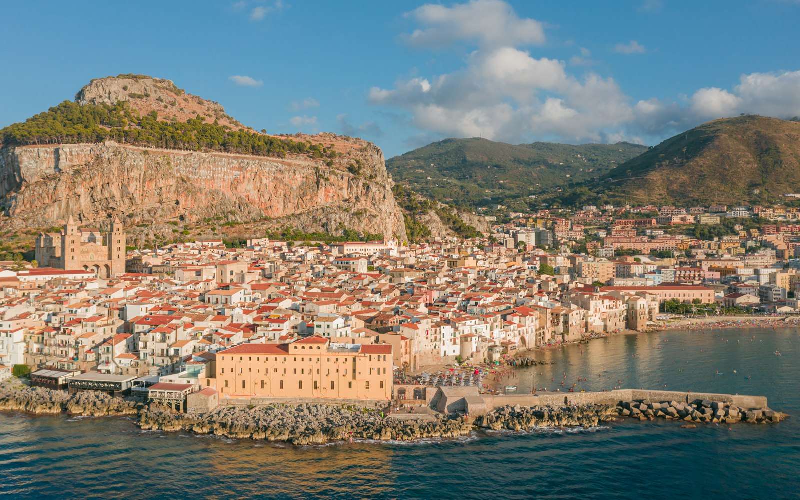 Cefalù beneath La Rocca from the sea
