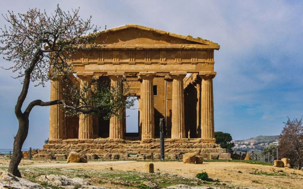 The Temple of Concordia at Agrigento with an almond tree in front